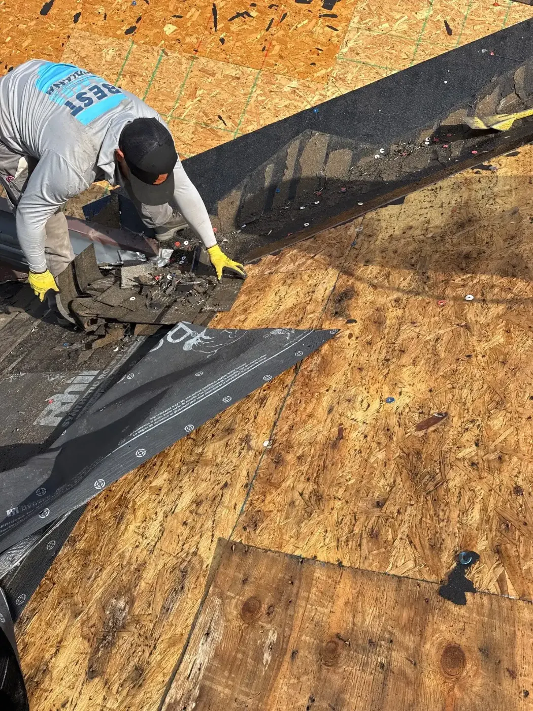 Tarping and dry-in on a Center Grove commercial roof